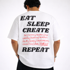 Person wearing a white t-shirt with text on the back