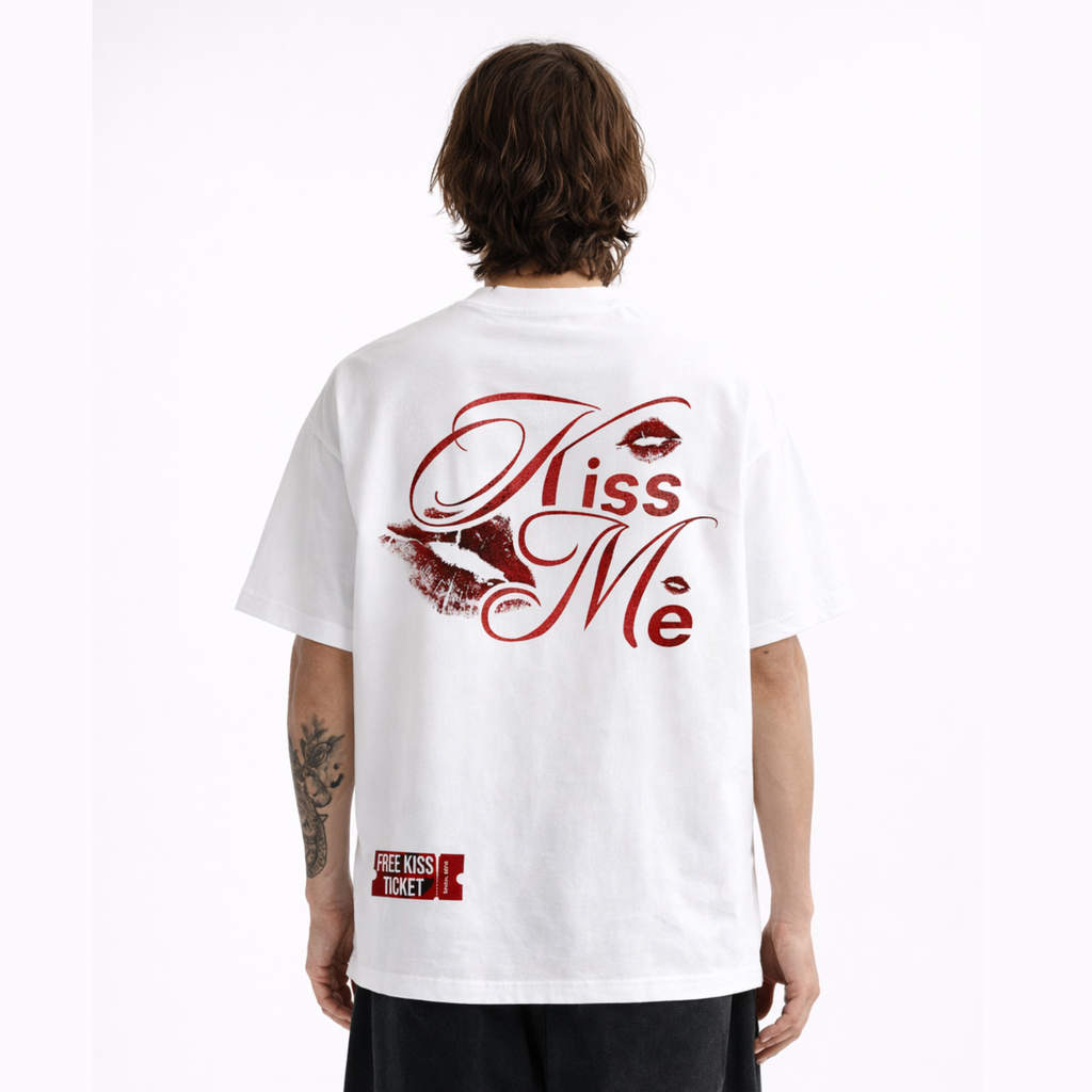 Person wearing a white t-shirt with 'Kiss Me' design on the back against a white background