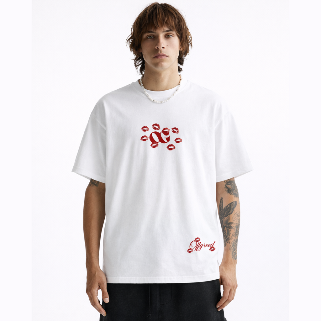 Person wearing a white t-shirt with red graphics on a white background