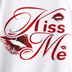 White t-shirt with red 'Kiss Me' text and lipstick marks on a white background